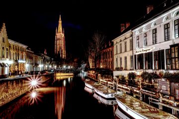 Bruges-Belgium-church-of-our-lady-night-canal-reflections-starburst-0610v2-07122022