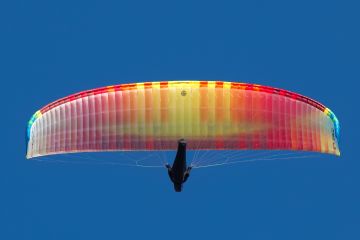 Paraglider-rainbow-colours-Branscombe-Devon-17102021